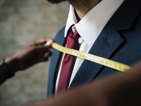 Measuring tape on a wooden surface